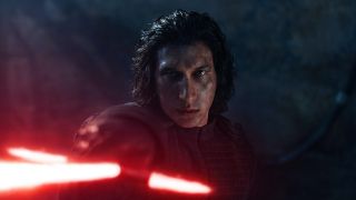 Adam Driver's Kylo Ren pointing red lightsaber in Star Wars: The Rise of Skywalker
