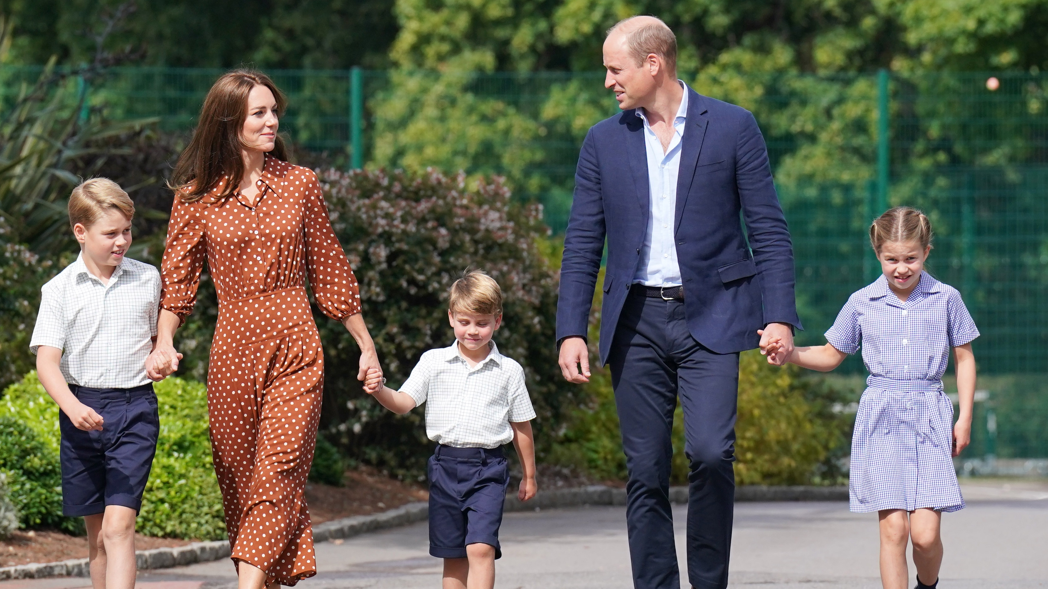 The Wales family walk as they arrive for a settling-in afternoon at Lambrook School