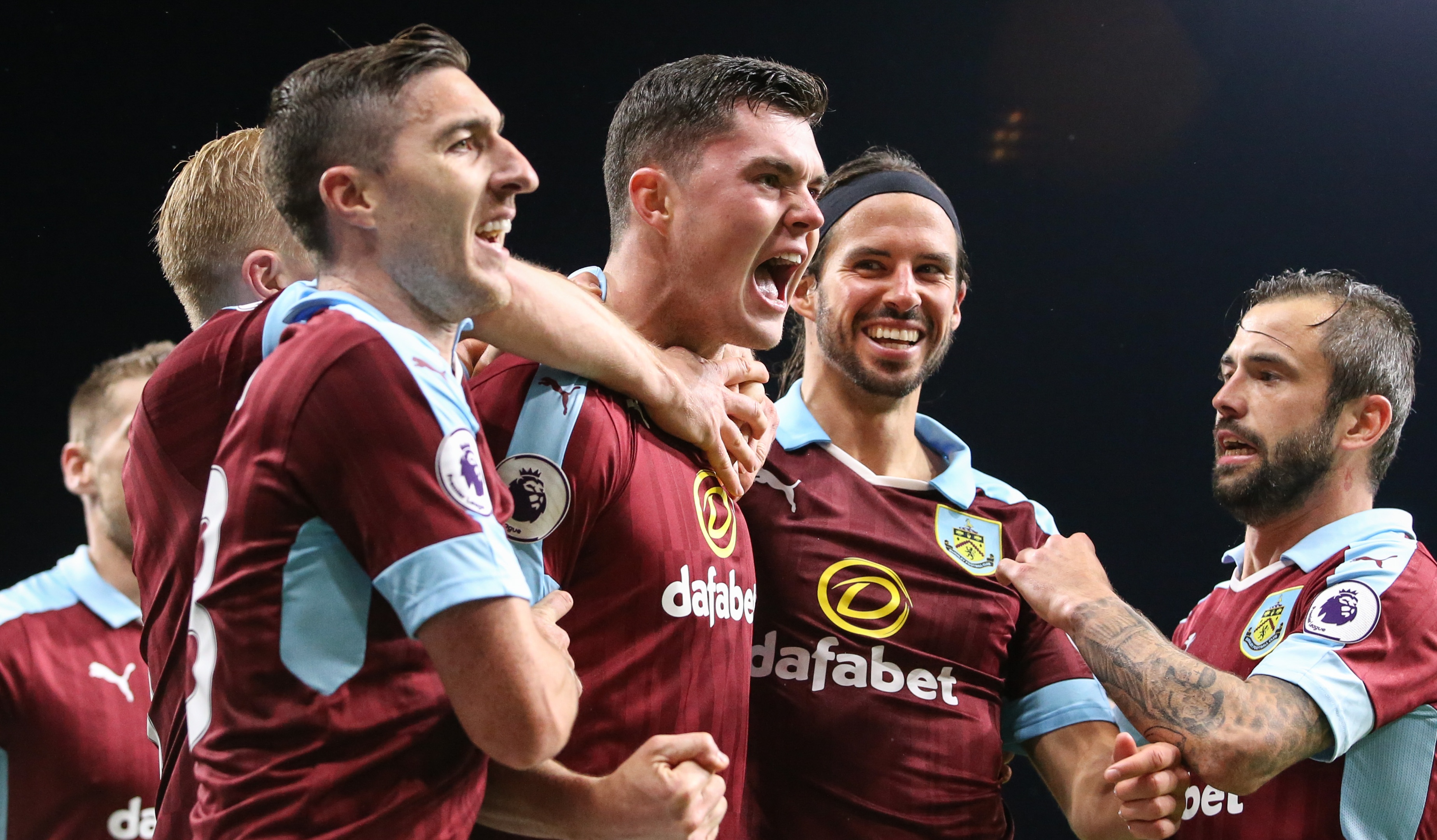 Burnley's Michael Keane, centre, celebrates scoring his sides second goal with team mates during the Premier League match against Watford at Turf Moor on September 26, 2016 in Burnley, England
