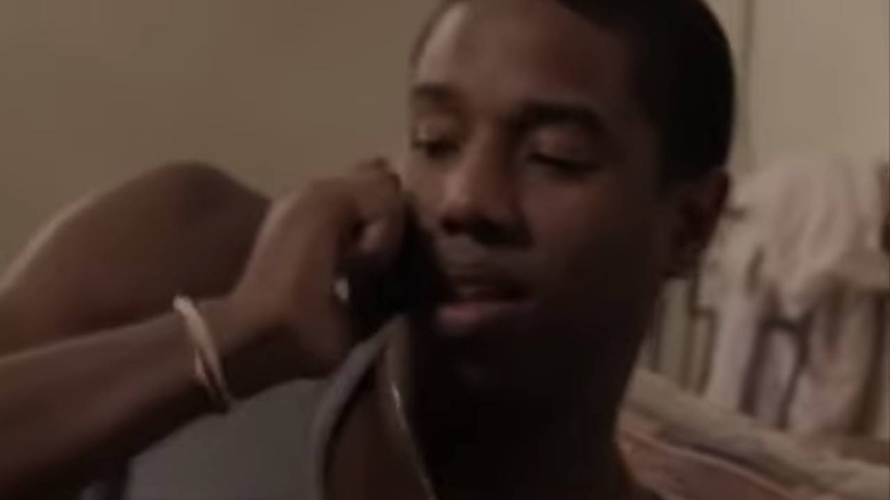 Michael B. Jordan answering the phone in Friday Night Lights