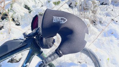 Image shows the Bar Mitts attached to a bike