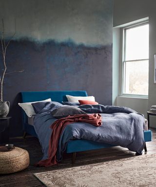 blue bedroom with double bed