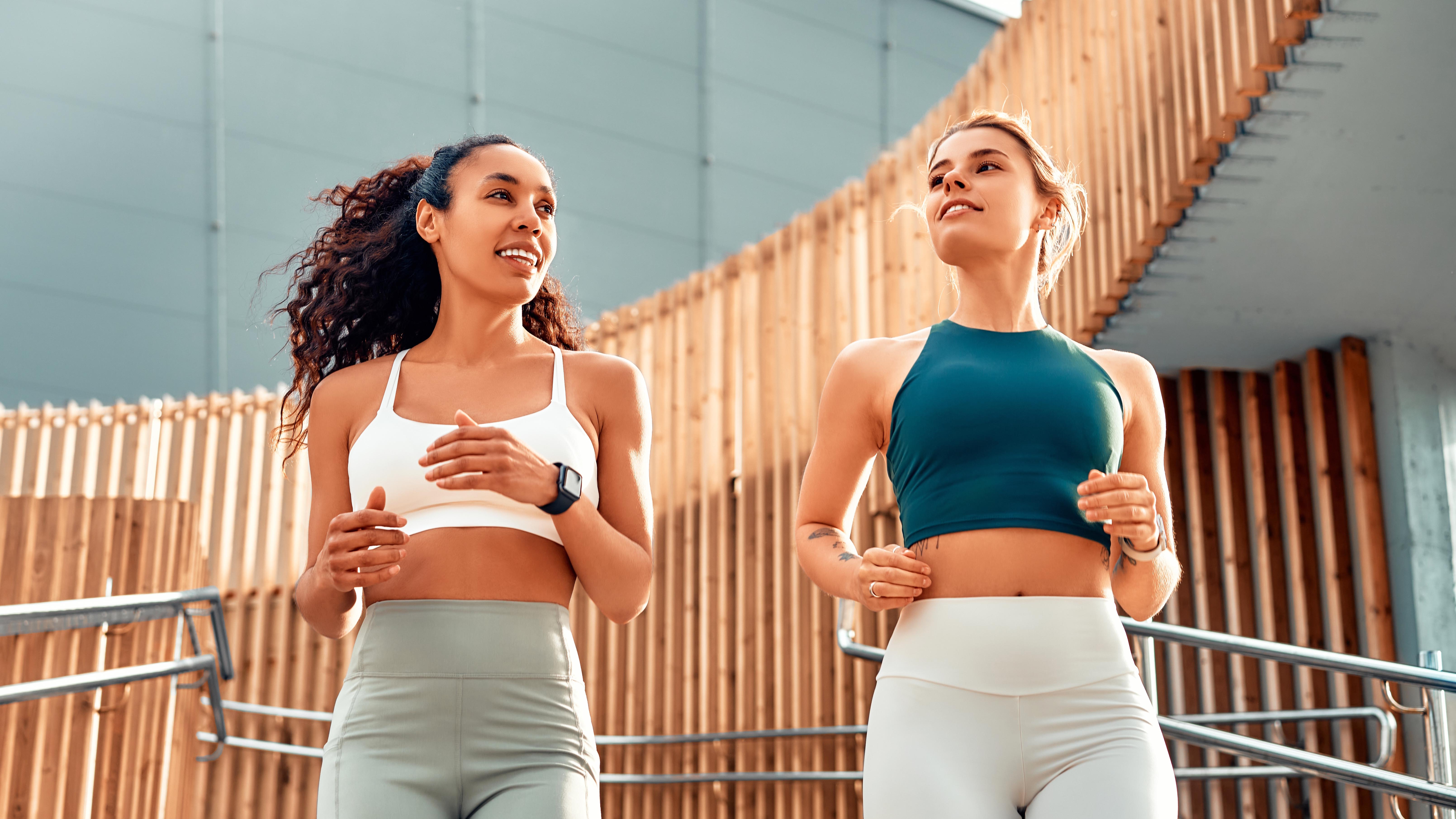 two women doing a walking workout