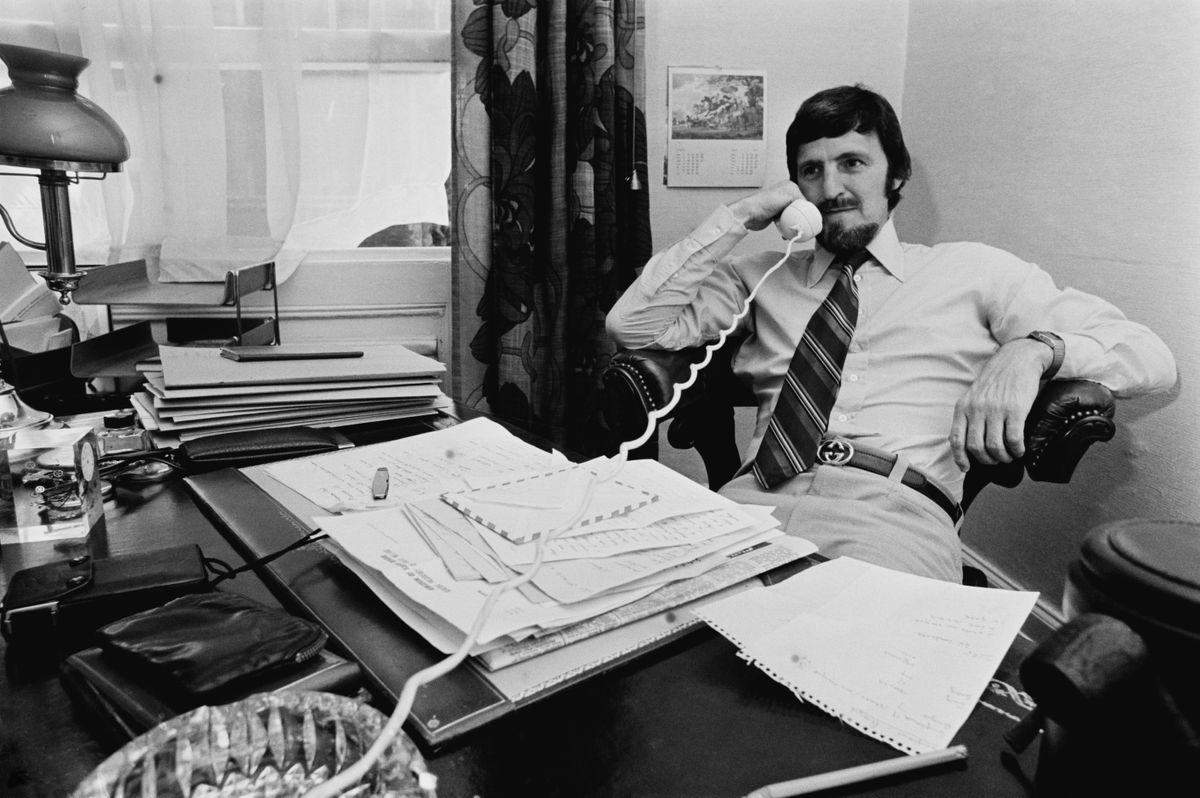 Jimmy Hill speaking on the phone, 1976