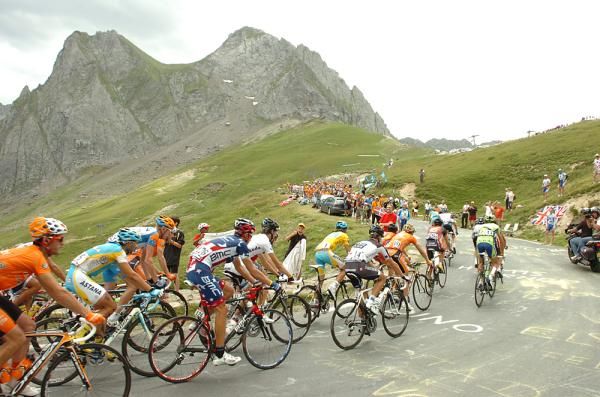 The main peloton ascends into the dizzying heights of the Pyrenees