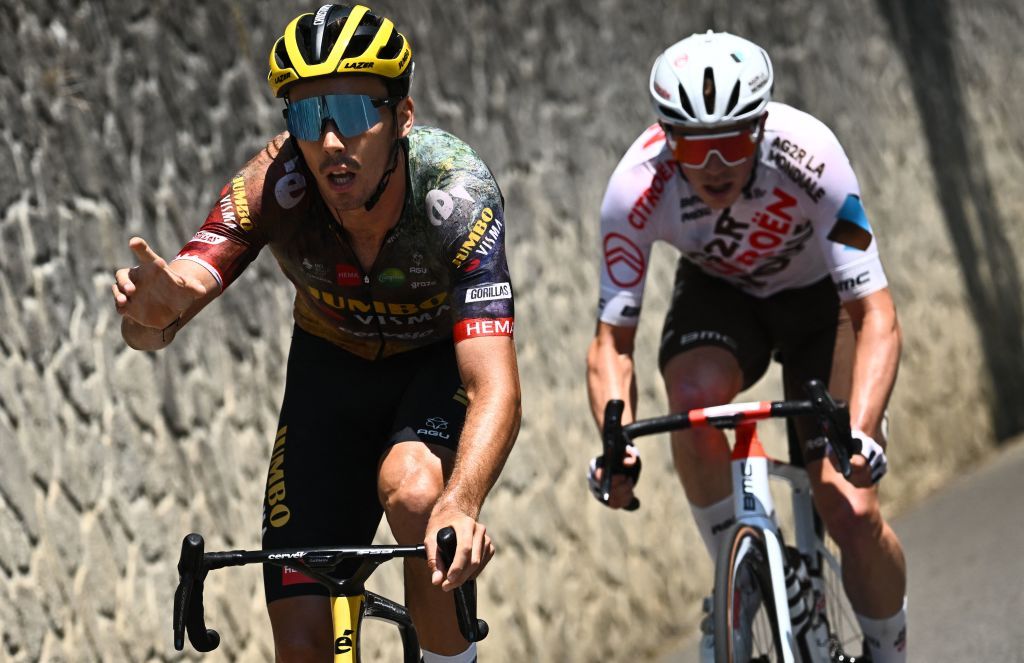 JumboVisma teams French rider Christophe Laporte L and AG2R Citroen Teams Belgian rider Stan Dewulf R cycle in a breakaway during the 18th stage of the 109th edition of the Tour de France cycling race 1432 km between Lourdes and Hautacam in the Pyrenees mountains in southwestern France on July 21 2022 Photo by AnneChristine POUJOULAT AFP Photo by ANNECHRISTINE POUJOULATAFP via Getty Images