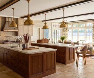 Dark wood kitchen with island, peninsula and dining table