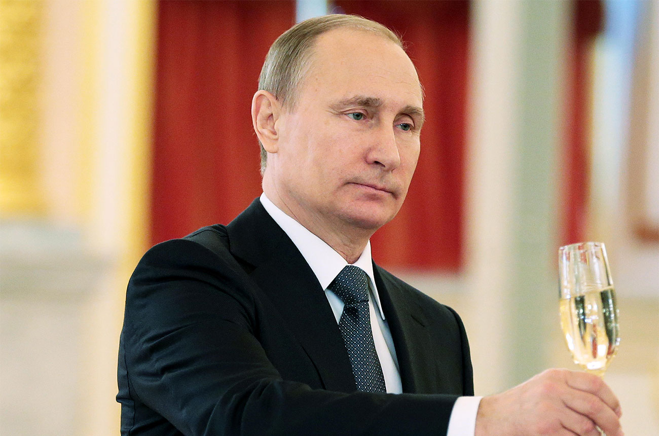 President Putin with a glass of Champagne