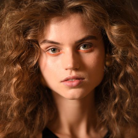 girl with dry shampoo in volumized hair