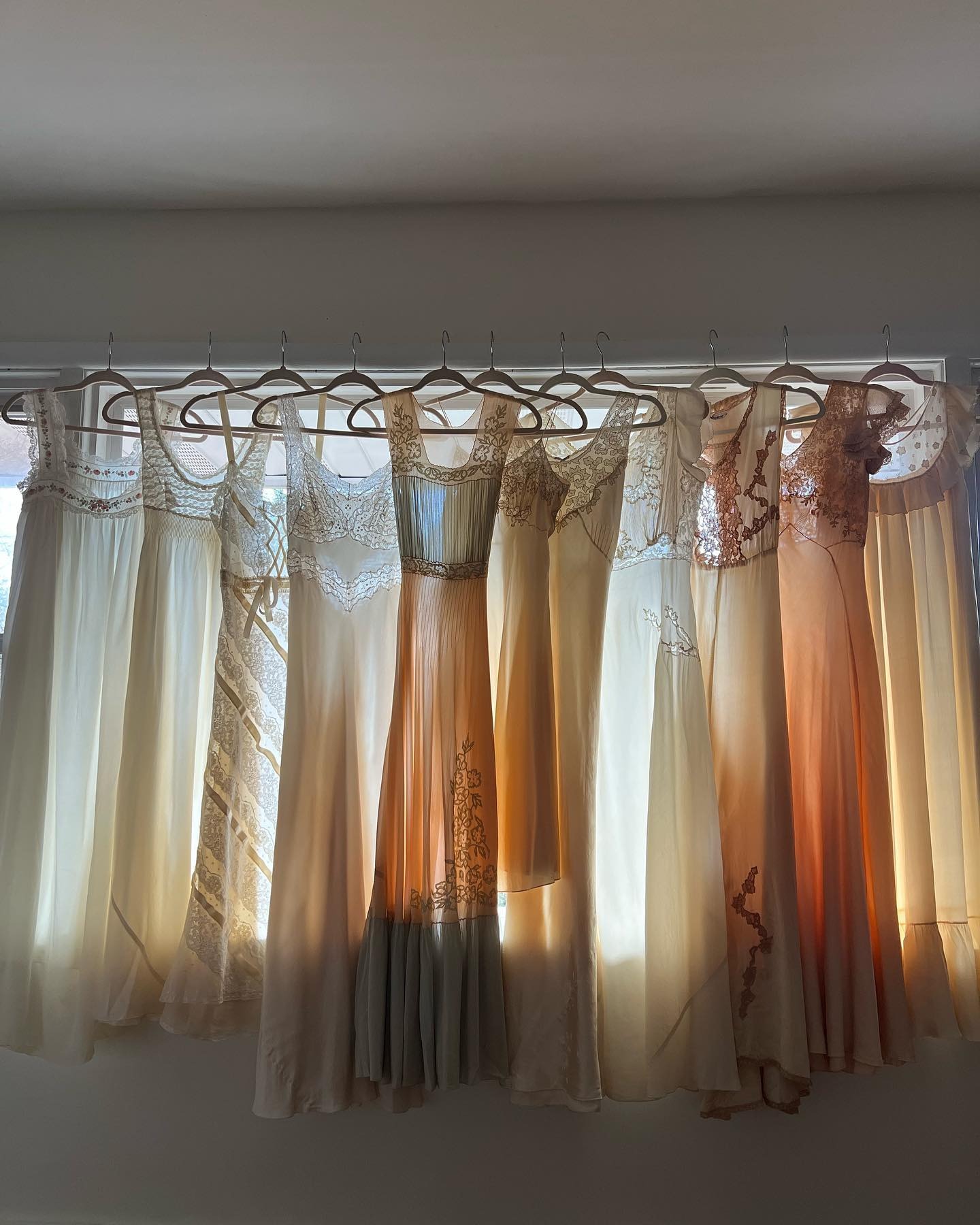 Various lace and sheer dresses.