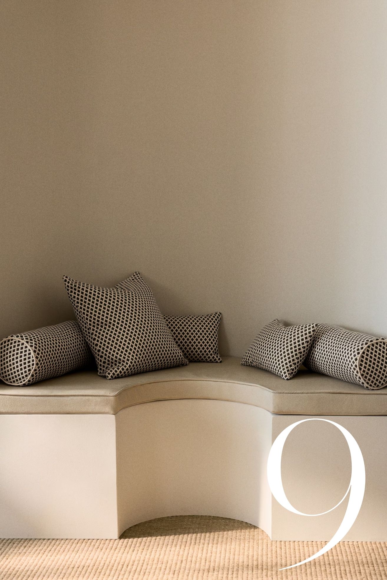 jacquard outdoor cushion covers on a built-in curved banquette seat