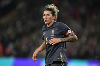 Millie Bright on the pitch for England