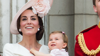 Catherine, Duchess of Cambridge, Princess Charlotte, Prince George, Prince William, Duke of Cambridge, Queen Elizabeth II and Prince Philip, Duke of Edinburgh stand on the balcony during the Trooping the Colour, this year marking the Queen's official 90th birthday at The Mall on June 11, 2016 in London, England