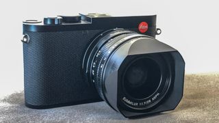 Leica Q2 camera on a carpeted floor