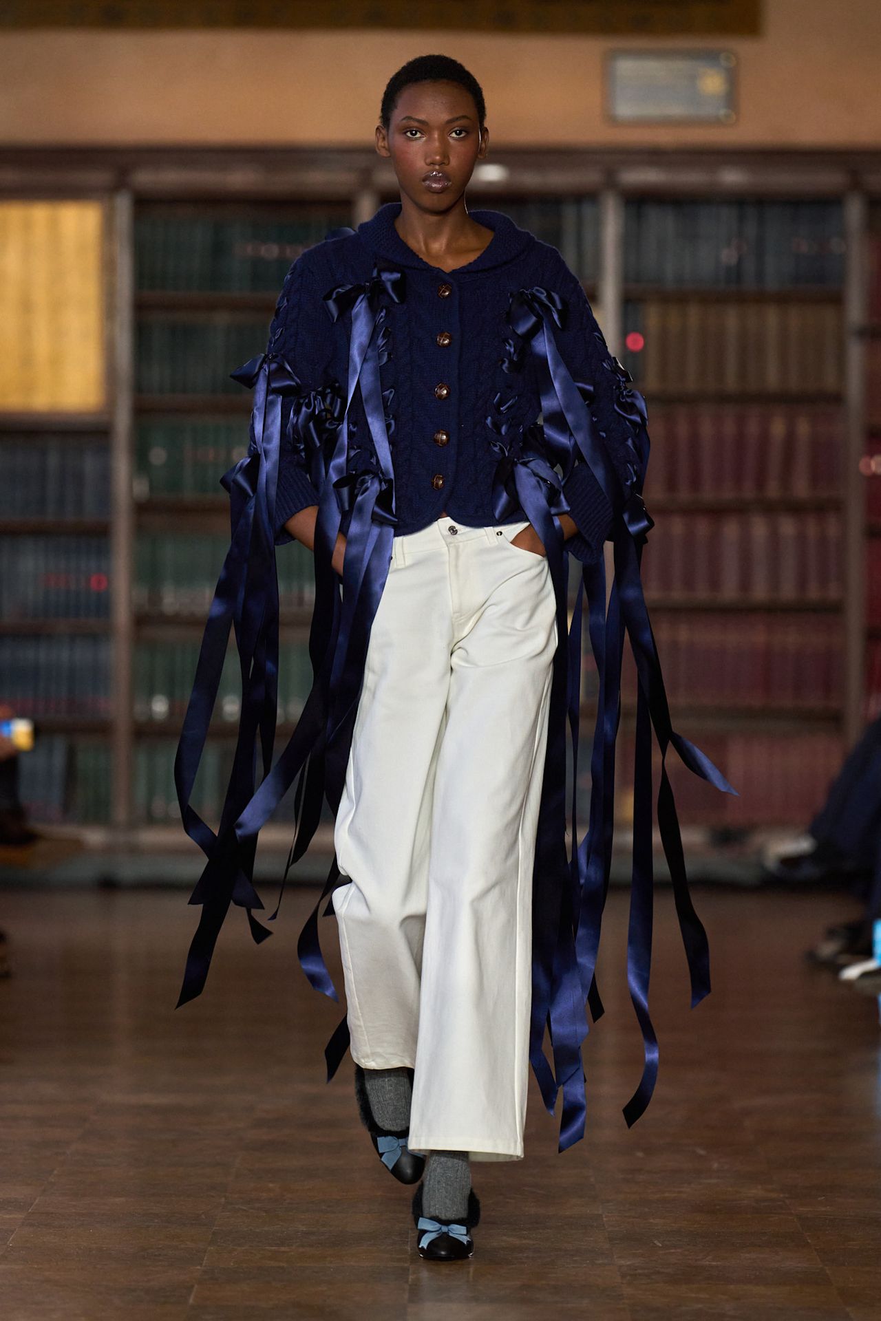 models walk the Sandy Liang Fall 2026 fashion show runway wearing slipper shoes