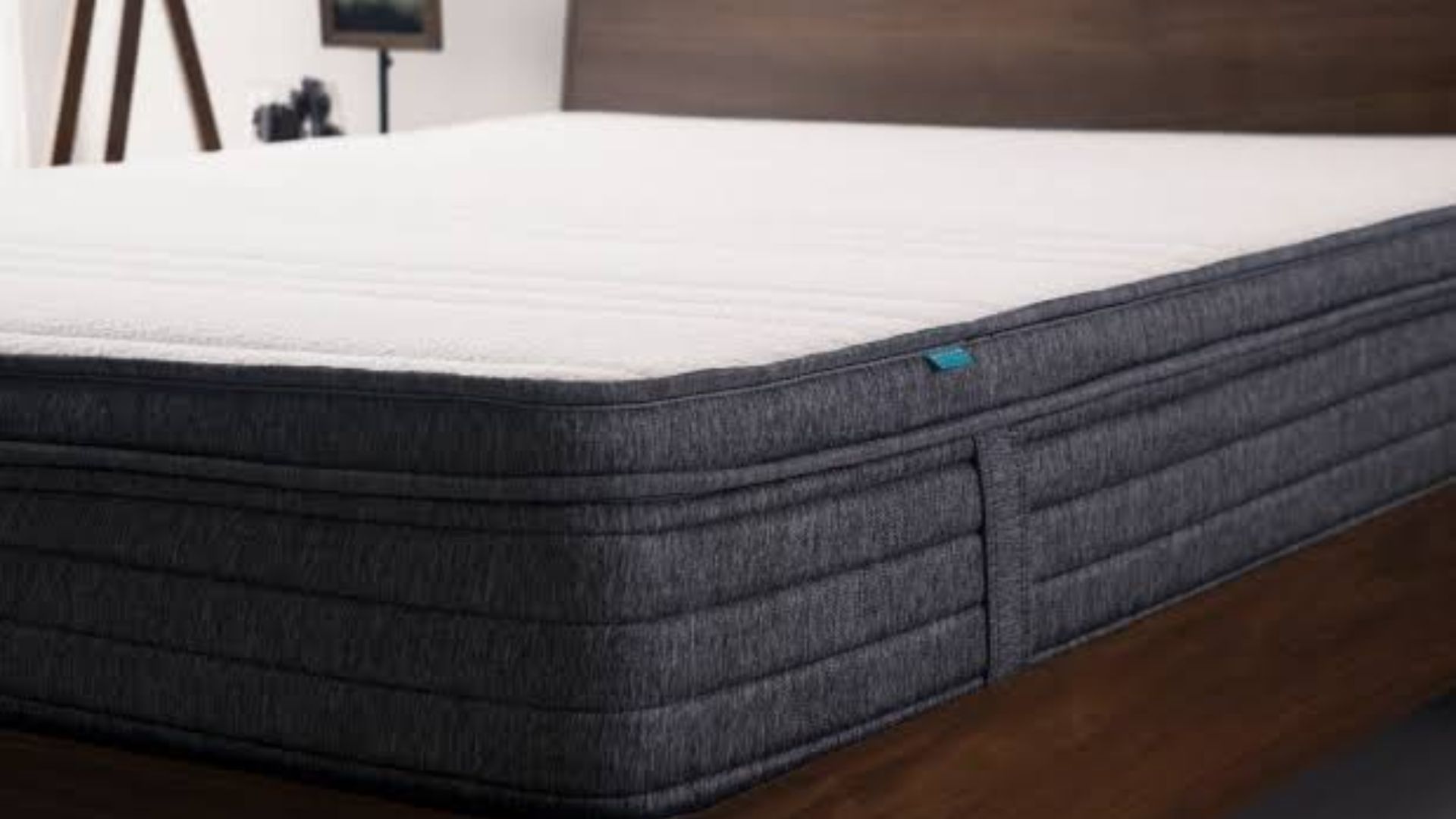 Origin Hybrid Mattress on a bed in a styled bedroom