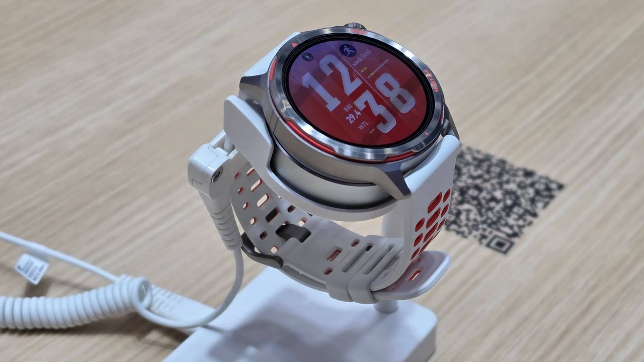 The Huawei Watch GT Runner 2 on a stand.