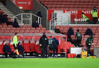 Dele Alli, right, trudges into the stand after being substituted