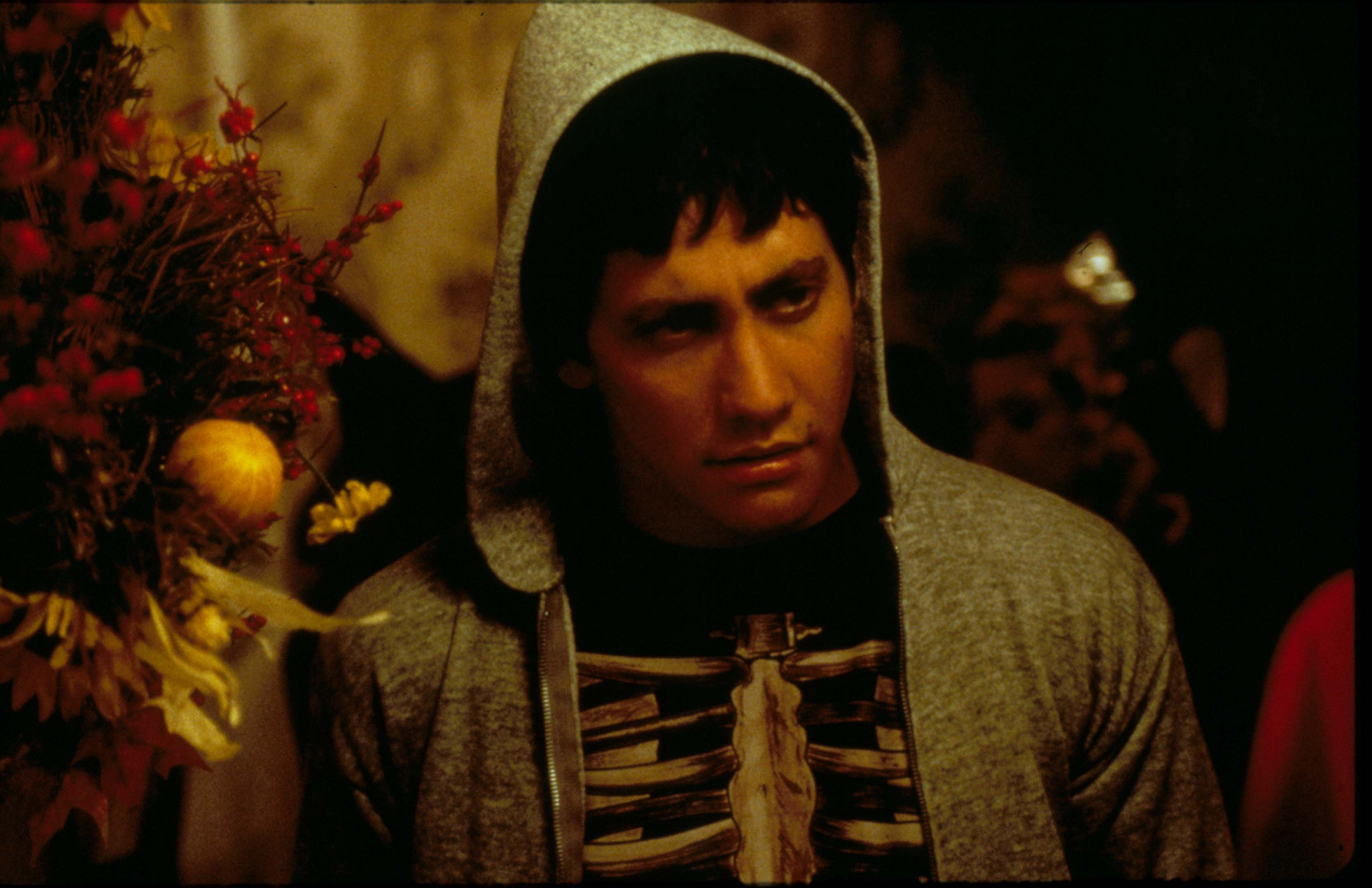 jake gyllenhaal dressed up as a skeleton at a halloween party in donnie darko