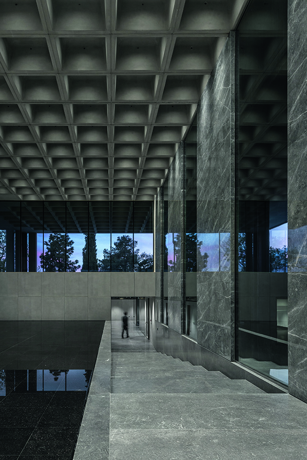 Greek brutalist gem AGET Iraklis by Alexandros Tombazis redesigned by Georges Batzios, clean concrete and marble and stone surfaces and shapes