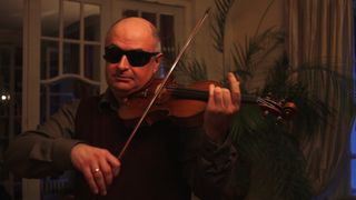 soloist doing blind violin test