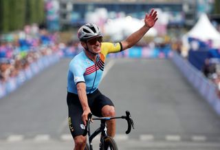 Remco Evenepoel survived a later puncture to win gold in the road race at the Paris Olympic Games