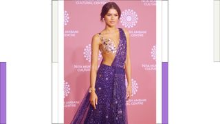 Zendaya wears a gold and purple saree style dress as she attends the launch of Nita Mukesh Ambani Cultural Centre (NMACC) on April 01, 2023 in Mumbai, India