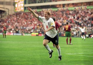 Paul Scholes celebrates after scoring for England against Portugal at Euro 2000.