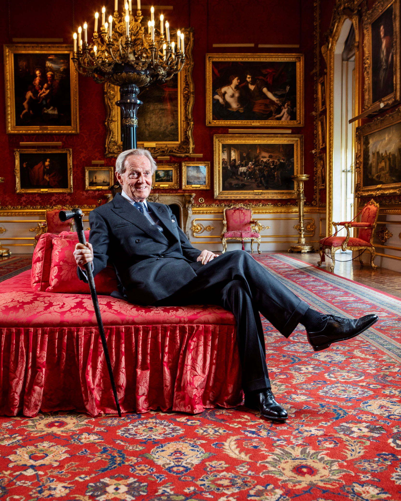 The 9th Duke of Wellington holds a walking stick ingeniously adapted as a hearing aid