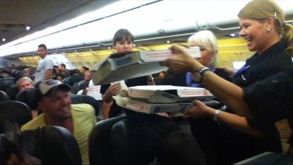Generous pilot buys pizza for 160 passengers on grounded flight