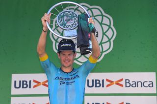COMO ITALY AUGUST 15 Podium Jakob Fuglsang of Denmark and Astana Pro Team Celebration Trophy during the 114th Il Lombardia 2020 a 231km race from Bergamo to Como ilombardia IlLombardia on August 15 2020 in Como Italy Photo by Tim de WaeleGetty Images