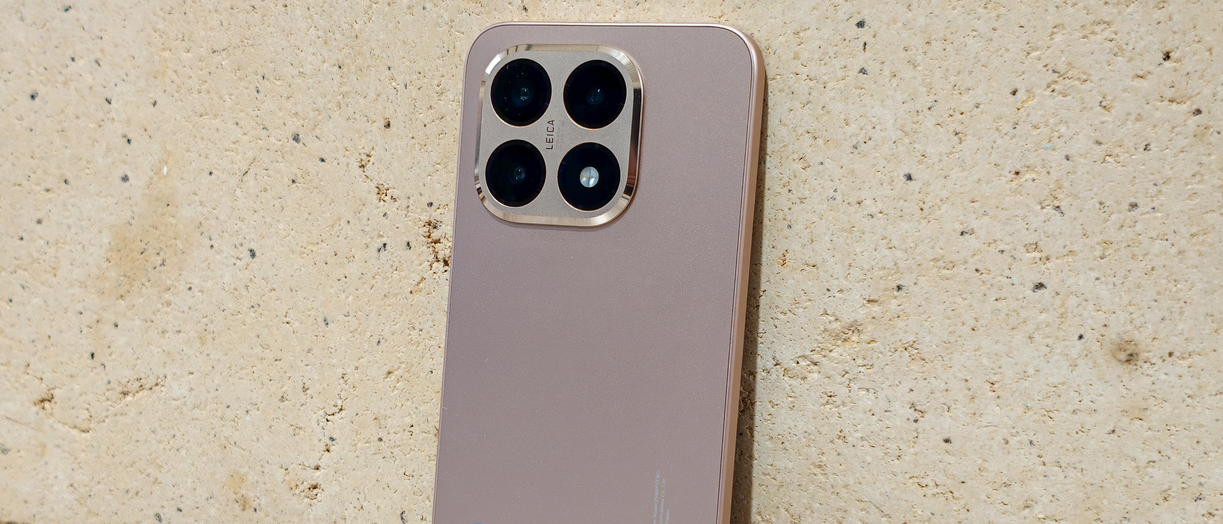 The Xiaomi 15T leaning against a wall