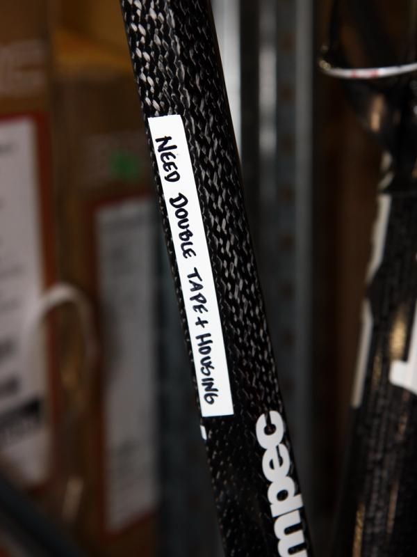 With so many bikes to manage, BMC team mechanics rely on a complex spreadsheet and handwritten notes placed right on the top tubes to keep track of what still needs to be done.