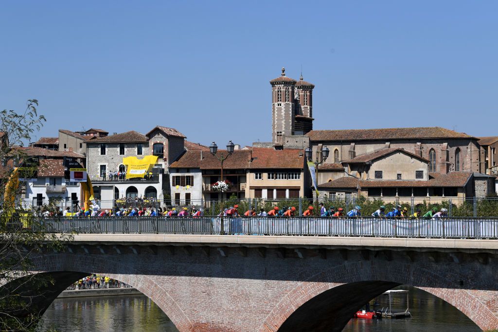 LOUDENVIELLE FRANCE SEPTEMBER 05 Start Adam Yates of The United Kingdom and Team Mitchelton Scott Yellow Leader Jersey CazresSurGaronne Village Peloton Bridge Landscape during the 107th Tour de France 2020 Stage 8 a 141km stage from CazresSurGaronne to Loudenvielle TDF2020 LeTour on September 05 2020 in Loudenvielle France Photo by Tim de WaeleGetty Images