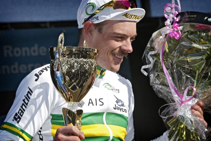 Alex Edmondson on the podium as the first winner of the U23 Tour of Flanders