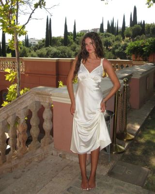 Woman wearing a Greece summer outfit.