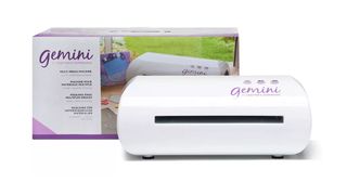 A product picture of the Gemini GEM-M-GLO embossing machine on a white background