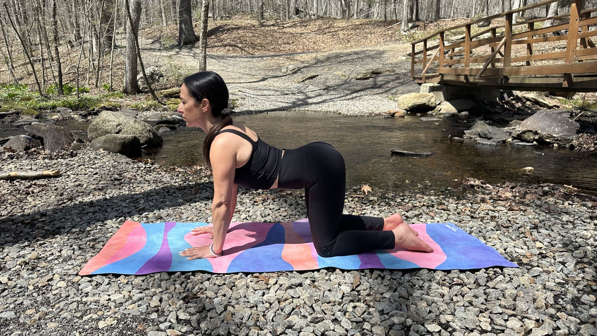 Yoga instructor Leah Pucciarelli demonstrates cat-cow