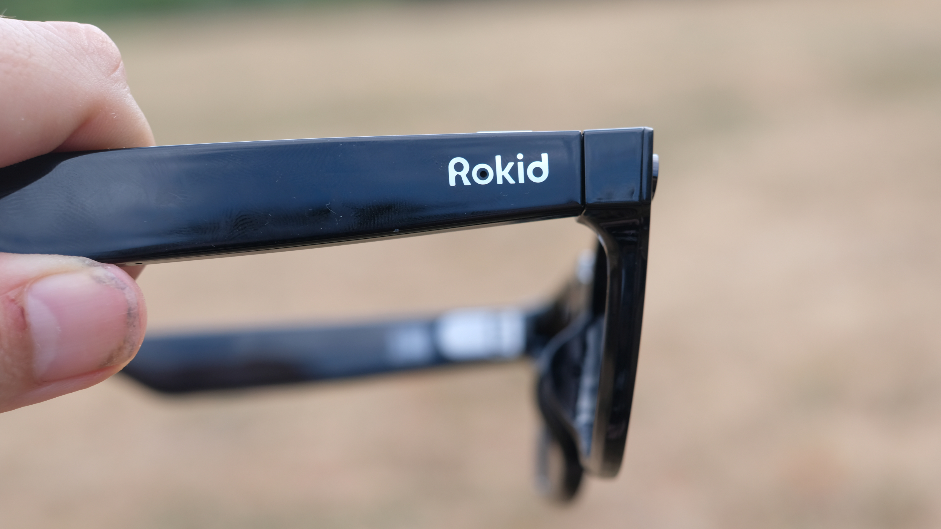 Hands-on photograph of Rokid AI Glasses Style