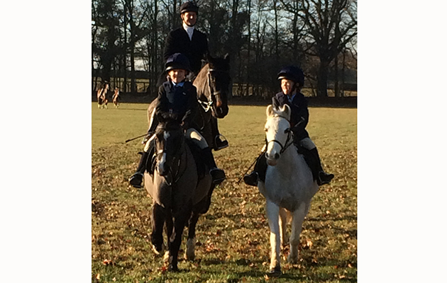 Sisters Imogen and Elsa Allan out with their father with the Crawley and Horsham