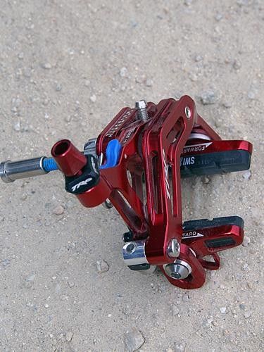 Aggressively machined arms shed grams without sacrificing much in the way of rigidity.