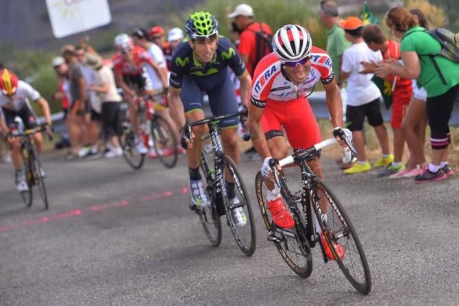 Alexandr Kolobnev's (Katusha) attack is watched closely by Imanol Ervitit (Movistar)