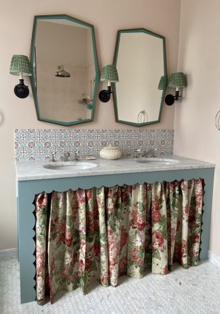 Twin mirrors and skins, tiled backsplash and blue theme