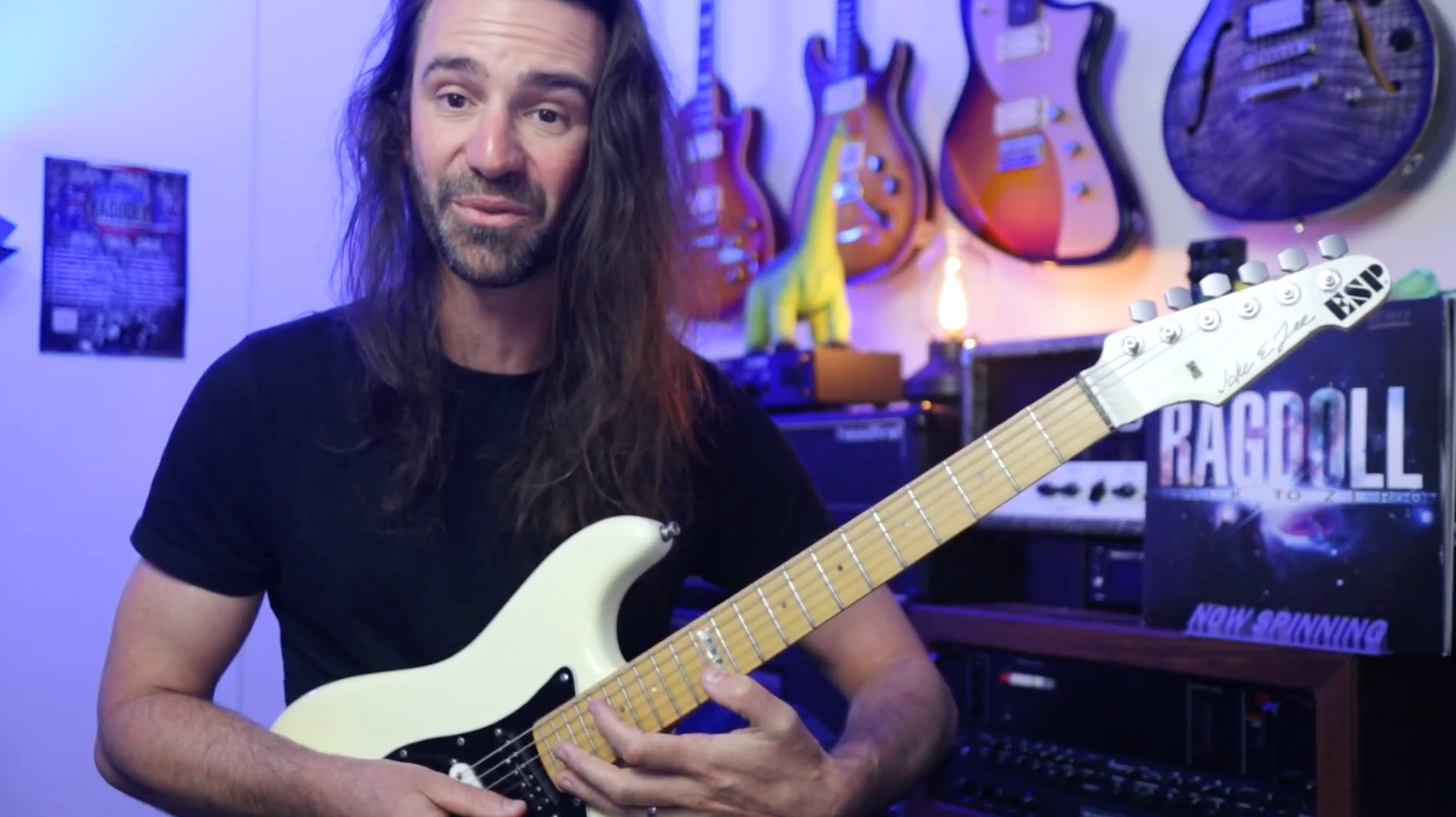 Jake E. Lee - stretching with the thumb on the fretboard