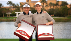 Bernhard and Jason Langer pose with the PNC Championship belts