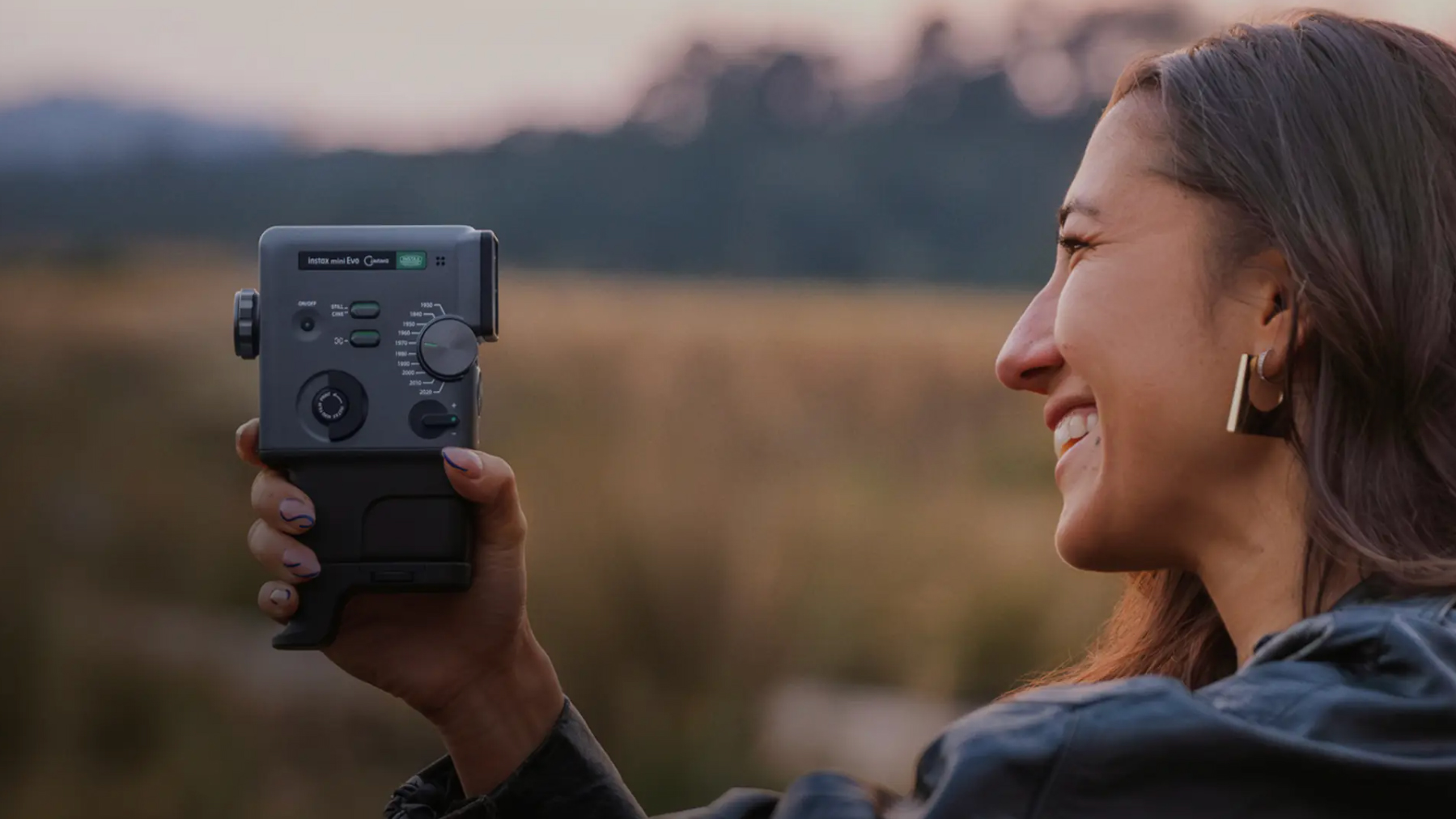 A Fujifilm Instax mini Evo Cinema hybrid instant camera