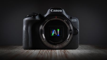 Canon camera, heavily silhouetted, with "AI" superimposed over its exposed sensor