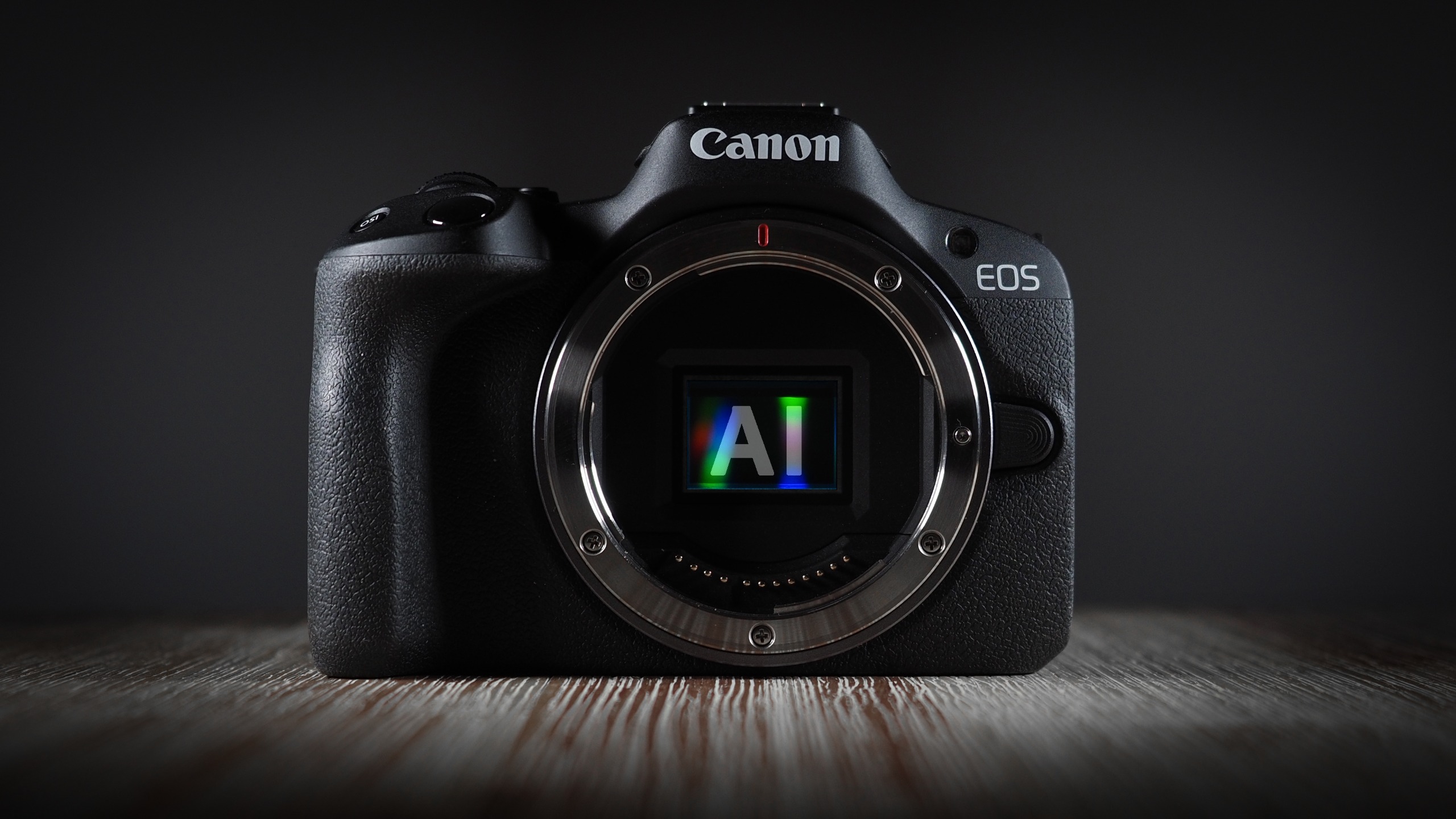 Canon camera, heavily silhouetted, with "AI" superimposed over its exposed sensor