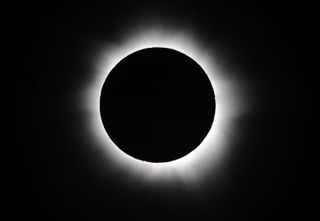 A view of the totally eclipsed sun, seen from Palm Cove, Australia in 2012.