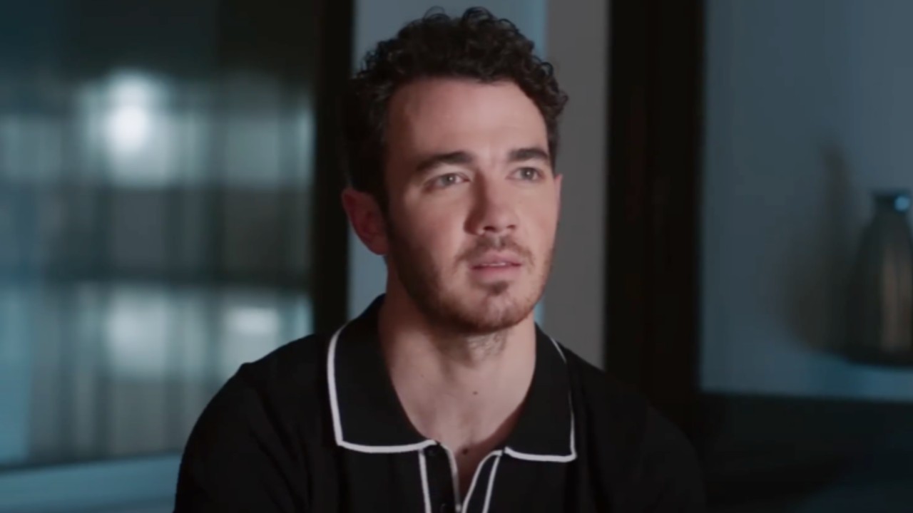 Kevin Jonas looking serious in the Jonas Brothers documentary Chasing Happiness. 